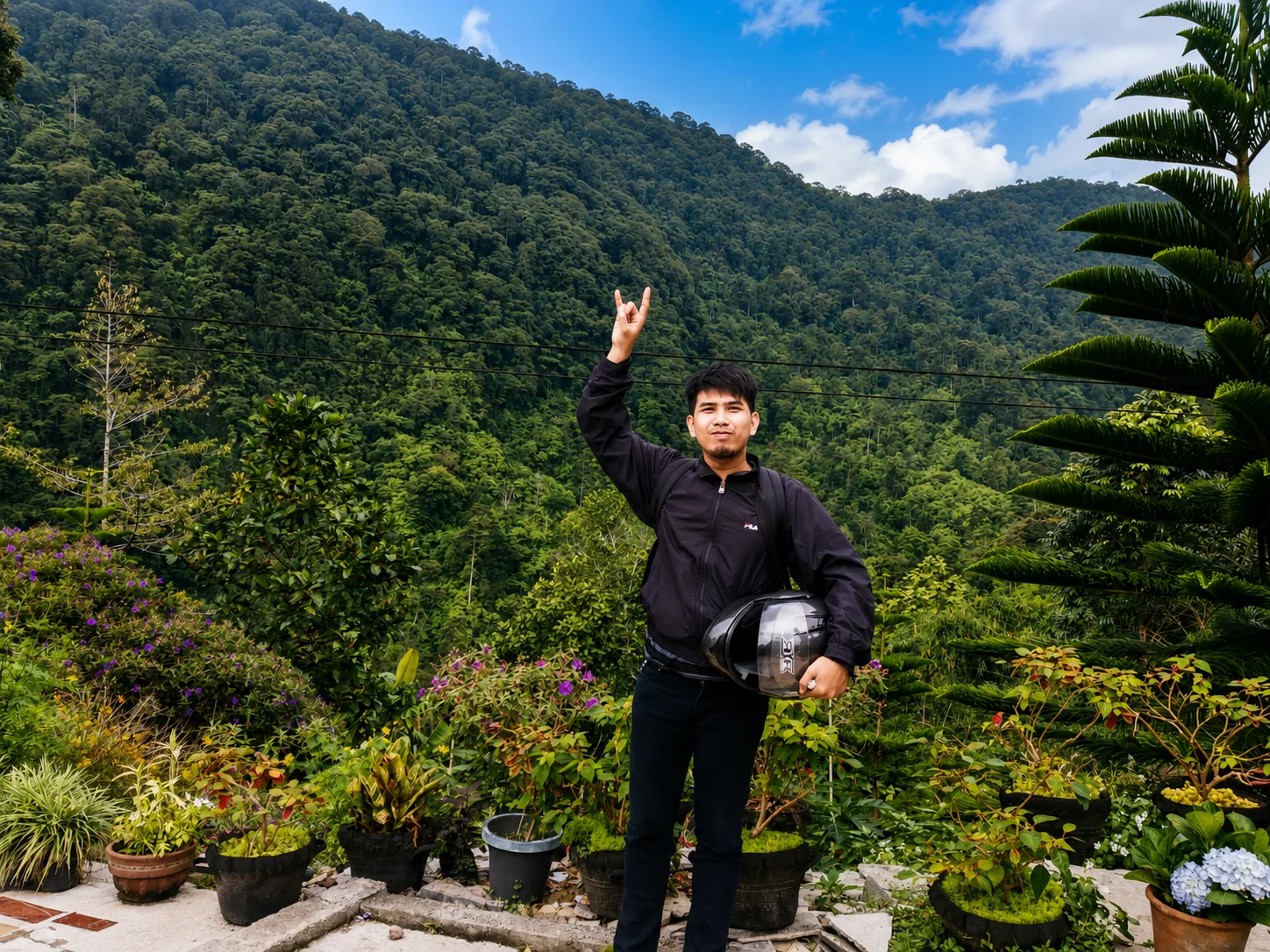 Xander outdoors with nature background